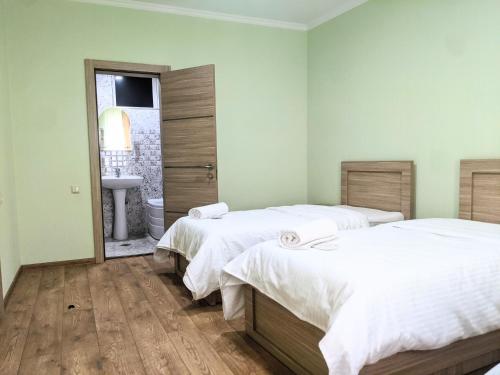 Katil atau katil-katil dalam bilik di Apart Hotel Georgia Gold
