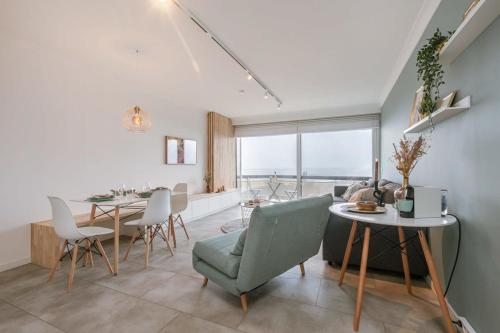 O zonă de relaxare la Huswell - Modern studio with seaview and parking