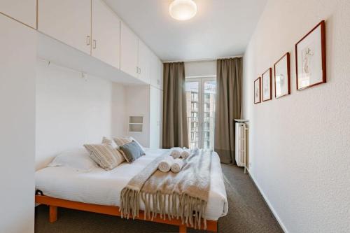 Кровать или кровати в номере Huswell - Cosy apartment with sea view