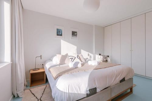 Ένα ή περισσότερα κρεβάτια σε δωμάτιο στο Huswell - Beautiful apartment with stunning view
