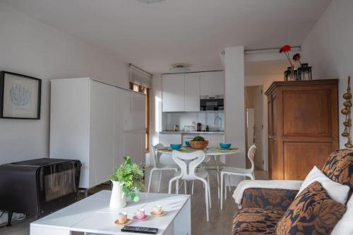 a living room with a couch and a table at Rural apartment in the mountains in Panticosa