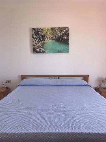 Katil atau katil-katil dalam bilik di Villaggio Quattro Scogli