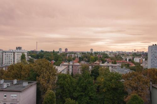 a view of a city with buildings and trees at Work & Stay Zagreb in Zagreb