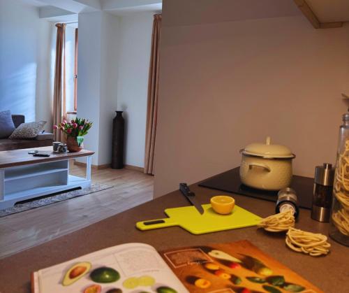 a living room with a table with food on it at Apartmany Fonte in Orechová Potôň