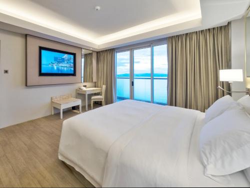 Cama o camas de una habitación en Dusit Thani Mactan Cebu Resort