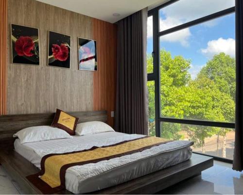 Katil atau katil-katil dalam bilik di Hotel Stylish Binh Long