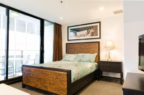 Ένα ή περισσότερα κρεβάτια σε δωμάτιο στο Luxury Oaks Horizons Apartment with a Pool