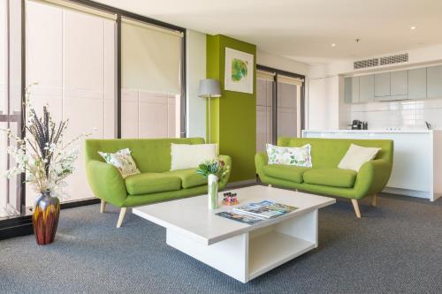 Zona de estar de Luxury Oaks Horizons Apartment with a Pool