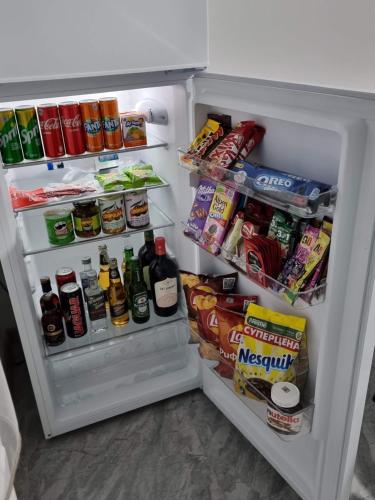 an open refrigerator filled with food and drinks at New Horizons , villa with 5 bedrooms, whole apartment, апартмент целиком in Dilijan