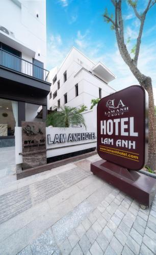 a sign for a hotel in front of a building at Lam Anh Hotel 6 Ngoại Giao Đoàn BT4-10 in Hanoi