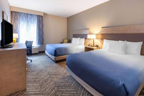 Ένα ή περισσότερα κρεβάτια σε δωμάτιο στο La Quinta Inn & Suites by Wyndham Middletown-Goshen