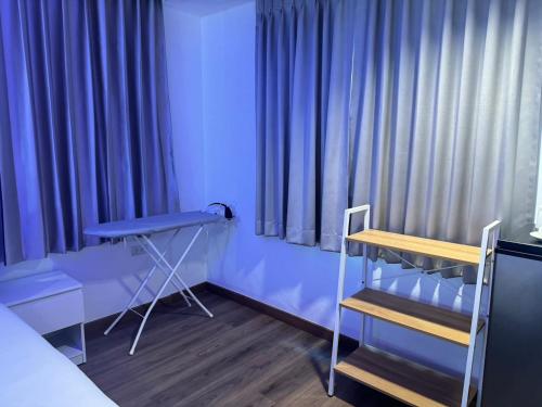 Neo Hatyai Hotelにあるベッド