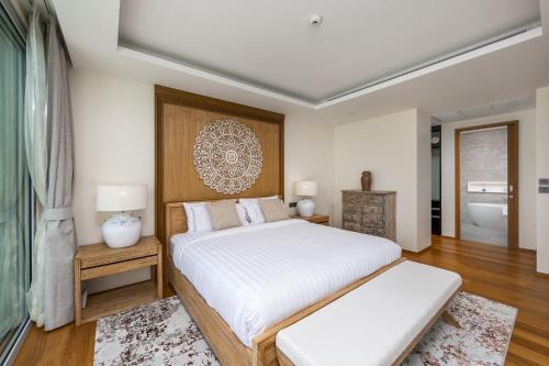 Katil atau katil-katil dalam bilik di Beachfront Residences - Stunning Sea and Lake View