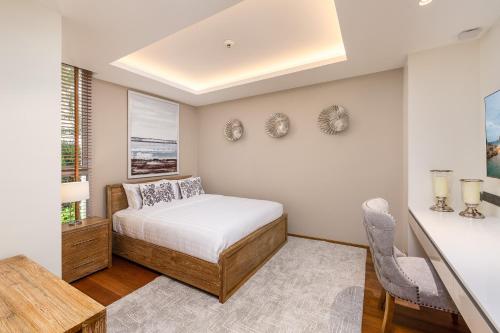 Katil atau katil-katil dalam bilik di Beachfront Residences - Stunning Sea and Lake View