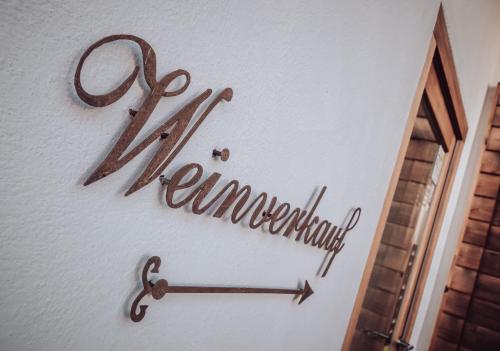 a scientology sign on the wall of a room at Ferienwohnung OberGuess in Leutschach