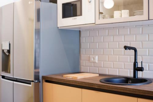 Dapur atau dapur kecil di ELECTRIC Rooms & Suites