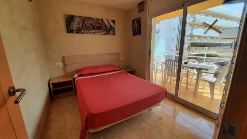Posteľ alebo postele v izbe v ubytovaní Fabuloso apartamento familiar con piscina en Salou