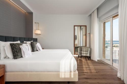 Katil atau katil-katil dalam bilik di Hotel Baia