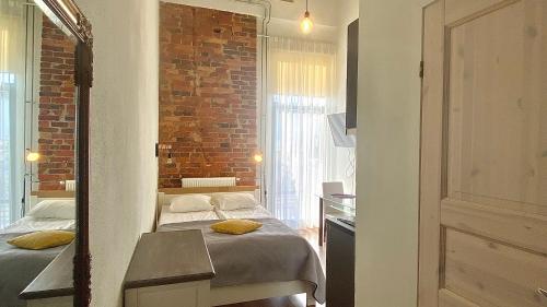 Katil atau katil-katil dalam bilik di Filosoofi 1 Studio Apartments