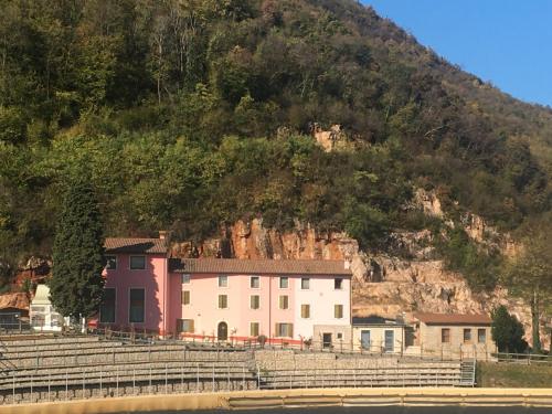 a building on the side of a mountain at Agriturismo Corte Marani in Badia Calavena