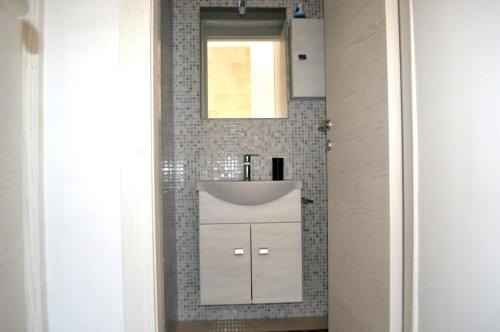 Koupelna v ubytování bilocale wabi al piano terra Ll03