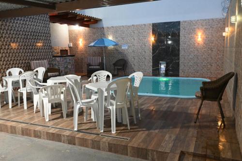 Bazén v ubytování Casa de aluguel para temporada em Caldas Novas nebo v jeho okolí