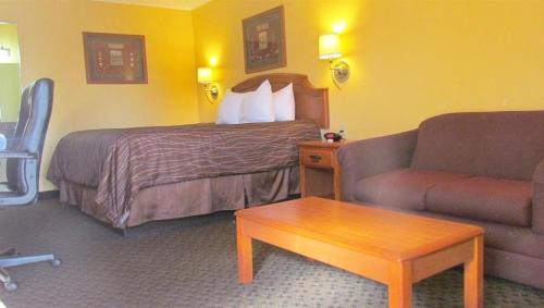 Χώρος καθιστικού στο Xecutive Inn and Suites