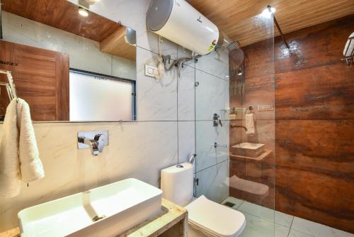 Ванная комната в Hotel Pawan Regency