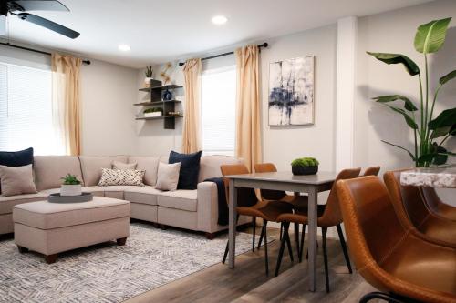 a living room with a couch and a table at Luxury 4 Large Bedrooms with 5 Beds and 3 Baths, a Quiet Street in Cascade Area in Atlanta