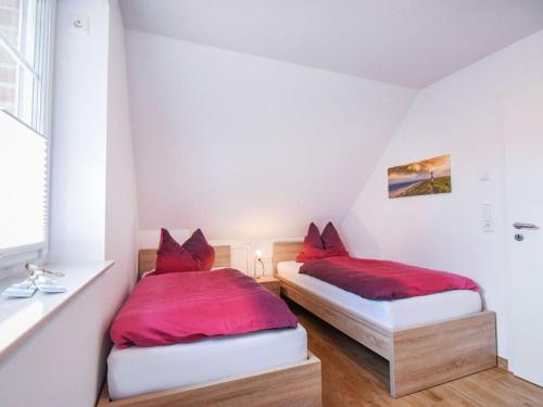 Postel nebo postele na pokoji v ubytování Holiday home Maja am See