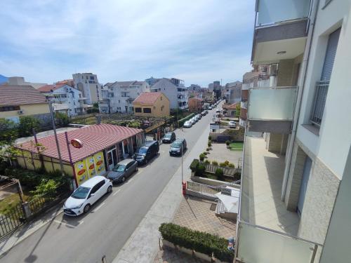 arial view of a city street with cars parked at Glory Suites in Budva