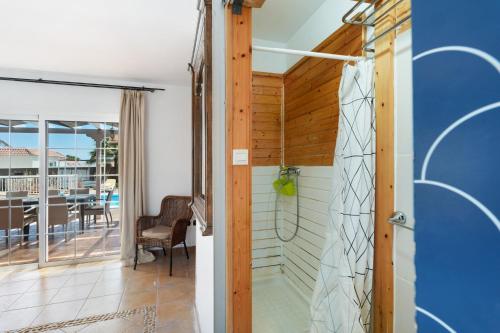 a bathroom with a shower in a house at Villa Golf del Sur in San Miguel de Abona