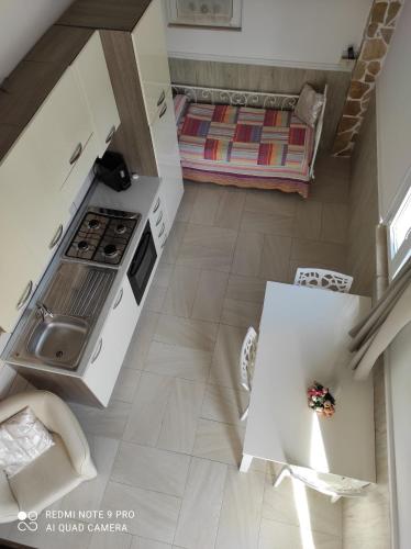 an overhead view of a kitchen and a living room at Re Sole Resort&Spa in Grottaglie