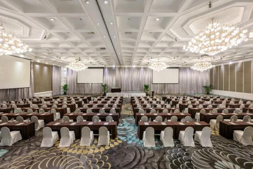 an image of a conference room with desks and chairs at Centara Grand at Central Plaza Ladprao Bangkok in Bangkok