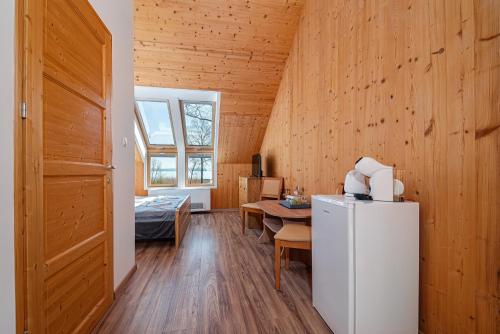 Postel nebo postele na pokoji v ubytování Golden Bridge Rooms