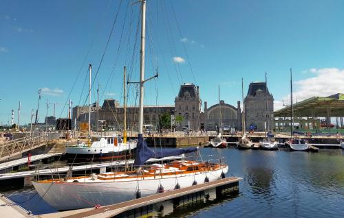 a sail boat docked at a dock in a harbor at Awesome Apartment In Oostende With Wifi in Ostend