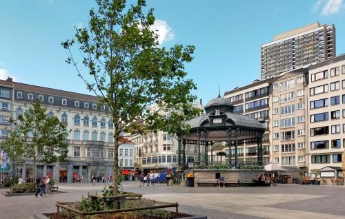 a gazebo in the middle of a city with buildings at Awesome Apartment In Oostende With Wifi in Ostend