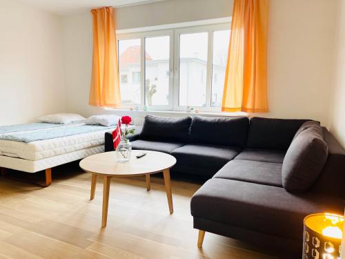 Гостиная зона в Scandinavian Apartment Hotel Fjordhavn - 2 room apartment
