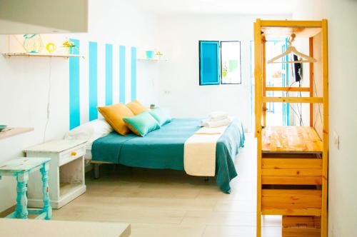 Postel nebo postele na pokoji v ubytování La Casita Surf