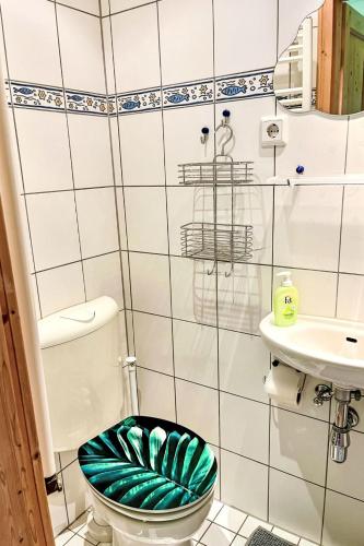 a bathroom with a toilet and a sink at Apartment Gebauer-1 by Interhome in Fuchshofen