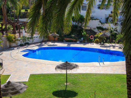The swimming pool at or close to Apartment Oasis by Interhome