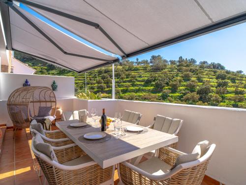 Balkón nebo terasa v ubytování Holiday Home Melon by Interhome