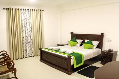 Krevet ili kreveti u jedinici u okviru objekta Suneetha Hotel