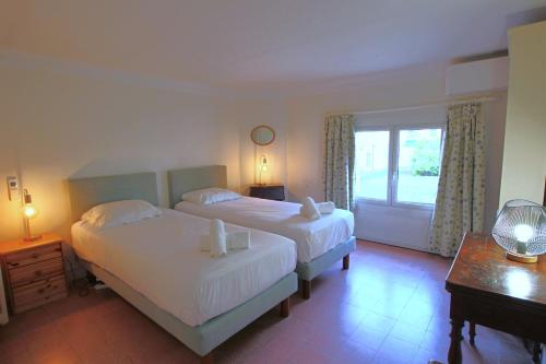 Ένα ή περισσότερα κρεβάτια σε δωμάτιο στο Sea View Apartment