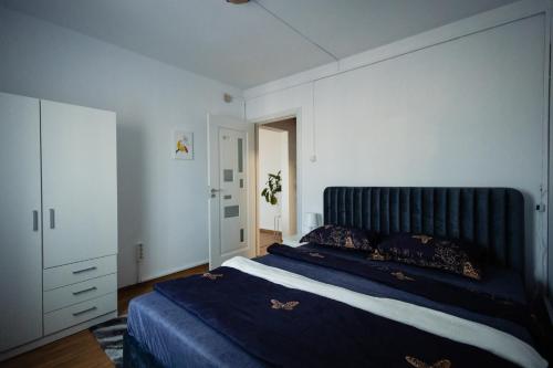 Postel nebo postele na pokoji v ubytování MM Apartments