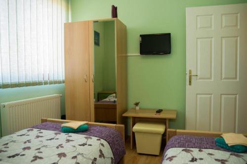 En eller flere senger på et rom på ROOMS free - Zagorje