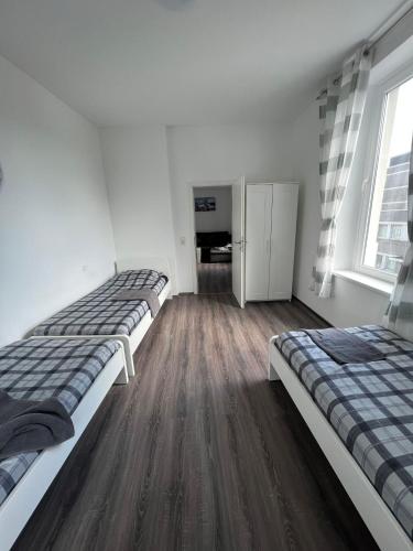 Postel nebo postele na pokoji v ubytování Apartments im Herzen von Velbert