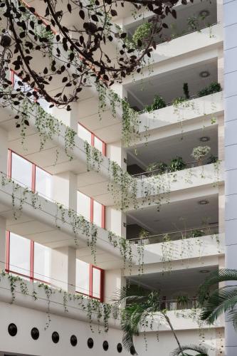 a building with plants growing out of it at Ibersol Almuñecar Beach & Spa Hotel in Almuñécar