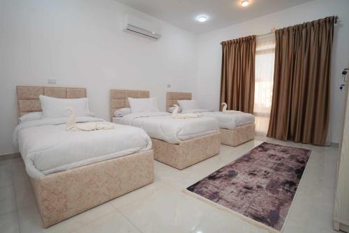 Katil atau katil-katil dalam bilik di Hostel