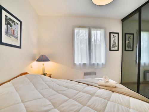 Katil atau katil-katil dalam bilik di Holiday Home beaurepaire by Interhome